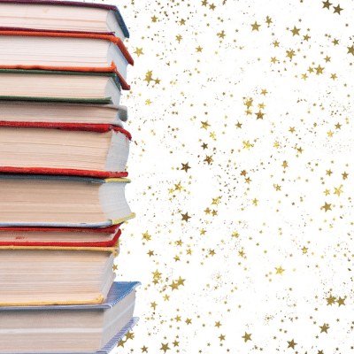 Stack of books with a starry background