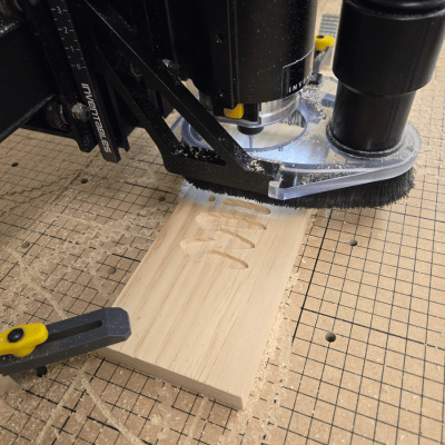 X-Carve CNC cutting a piece of wood